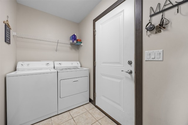 210 Northgate St NW, Shellsburg, IA 52332 - laundry room featuring washer and dryer and light tile patterned floors