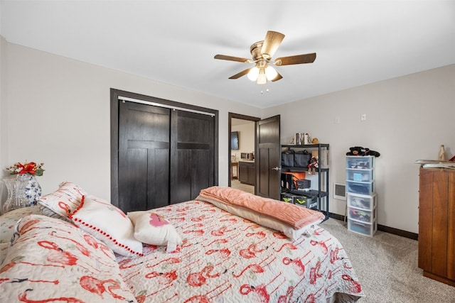 210 Northgate St NW, Shellsburg, IA 52332 - carpeted bedroom featuring a closet and ceiling fan
