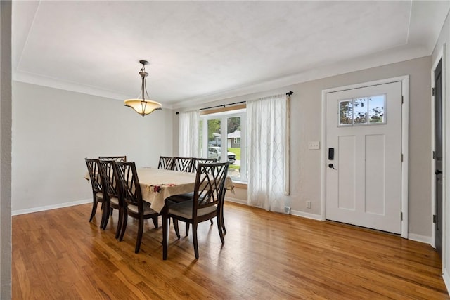 3642 Redbud Rd NE, Cedar Rapids, IA 52402 - dining space with light wood-style floors and baseboards