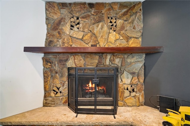 3642 Redbud Rd NE, Cedar Rapids, IA 52402 - detailed view of a stone fireplace