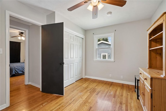 3642 Redbud Rd NE, Cedar Rapids, IA 52402 - unfurnished office featuring ceiling fan and light wood-type flooring