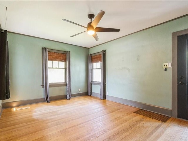 425 24th NE, Cedar Rapids, IA 52402 - empty room featuring ceiling fan and light wood-style floors