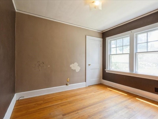 425 24th NE, Cedar Rapids, IA 52402 - unfurnished room featuring light wood finished floors and ornamental molding