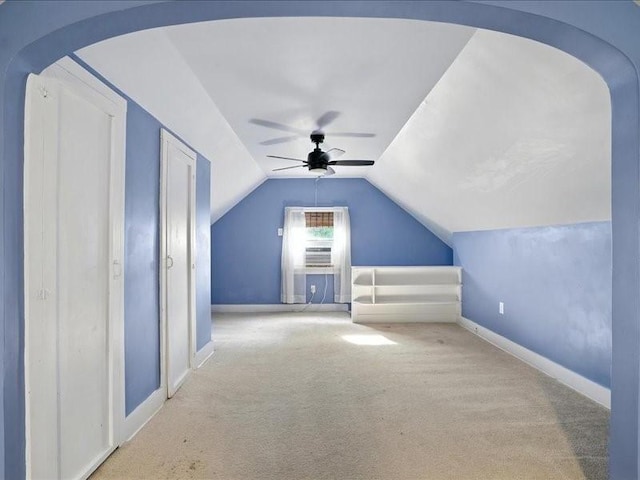 425 24th NE, Cedar Rapids, IA 52402 - bonus room featuring ceiling fan, arched walkways, carpet floors, and vaulted ceiling