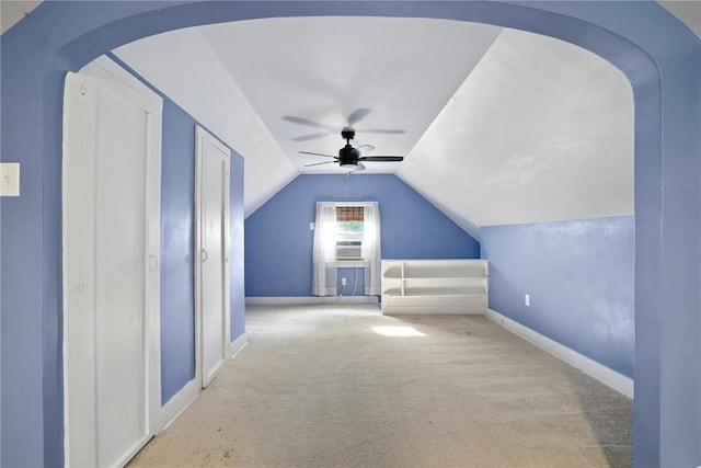 425 24th NE, Cedar Rapids, IA 52402 - bonus room with carpet flooring, arched walkways, ceiling fan, and lofted ceiling