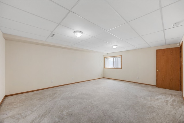 819 Winterberry Pl NE, Cedar Rapids, IA 52402 - carpeted empty room with a smoke detector and a drop ceiling