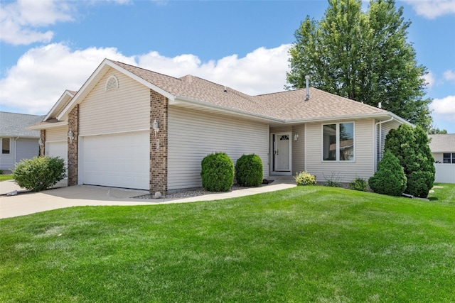 819 Winterberry Pl NE, Cedar Rapids, IA 52402 - ranch-style home with an attached garage, driveway, a front lawn, a shingled roof, and brick siding