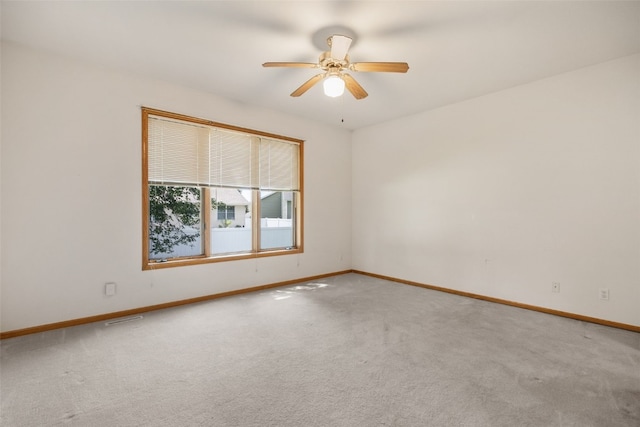 819 Winterberry Pl NE, Cedar Rapids, IA 52402 - unfurnished room featuring carpet flooring and ceiling fan