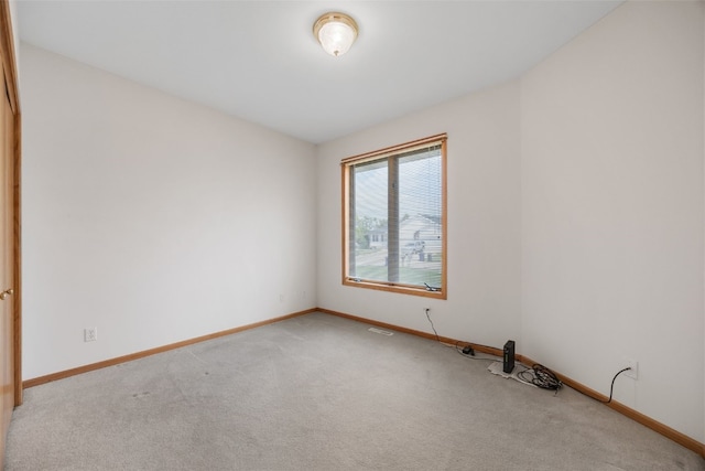 819 Winterberry Pl NE, Cedar Rapids, IA 52402 - carpeted empty room featuring baseboards