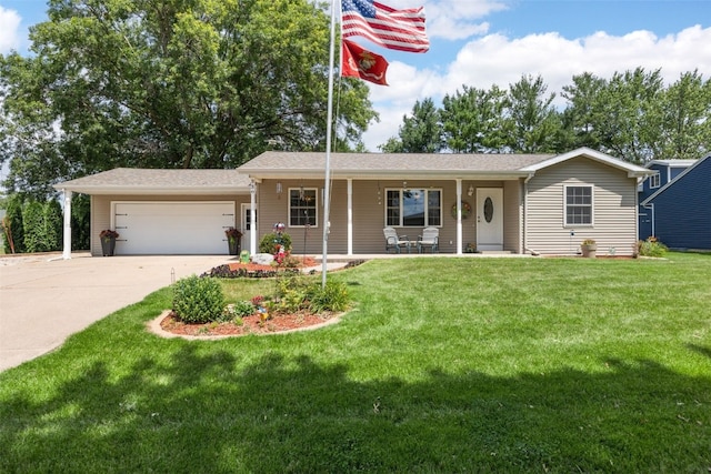 330 E S St, Lisbon, IA 52253 - single story home with a garage, driveway, a porch, and a front yard