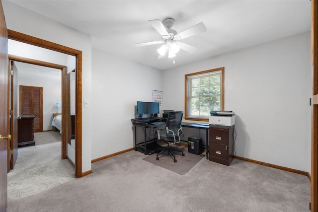 330 E S St, Lisbon, IA 52253 - carpeted office space featuring ceiling fan and baseboards