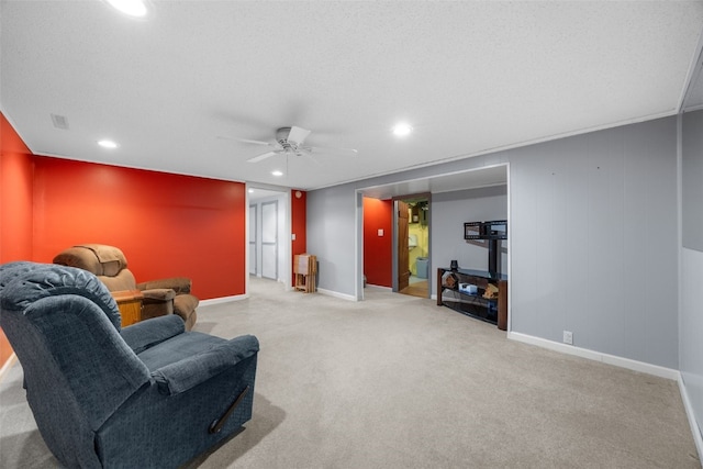 330 E S St, Lisbon, IA 52253 - carpeted living area featuring recessed lighting and ceiling fan