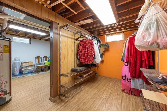 330 E S St, Lisbon, IA 52253 - below grade area featuring gas water heater and wood finished floors