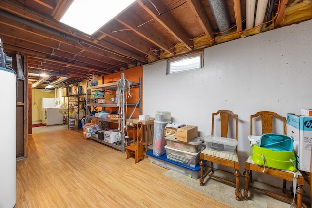 330 E S St, Lisbon, IA 52253 - basement with washer / clothes dryer and wood finished floors