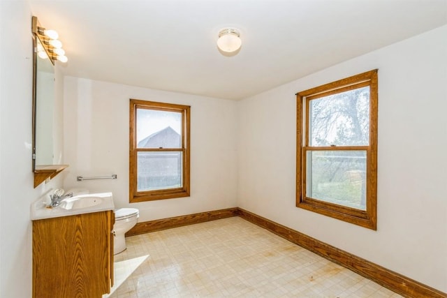 4100 Greens Grove Rd, Center Point, IA 52213 - bathroom with healthy amount of natural light, tile patterned floors, and vanity