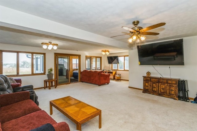 4100 Greens Grove Rd, Center Point, IA 52213 - carpeted living room with baseboards and ceiling fan