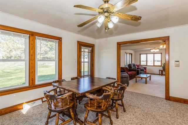 4100 Greens Grove Rd, Center Point, IA 52213 - dining space featuring light colored carpet and ceiling fan