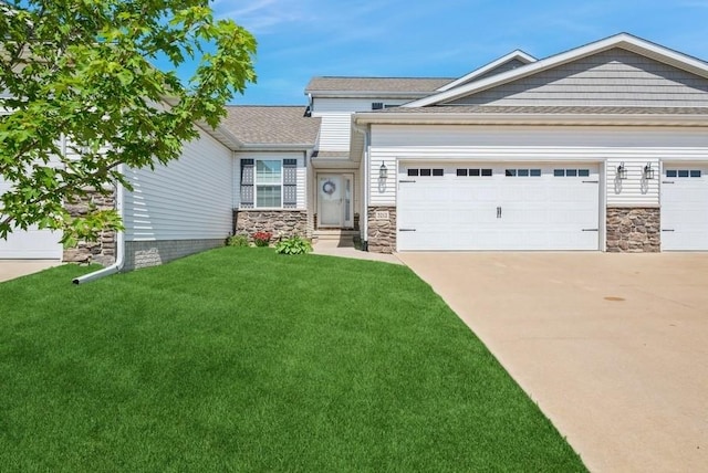 3212 Sherwood Pl, Marion, IA 52302 - view of front facade featuring stone siding, a garage, a front lawn, and concrete driveway