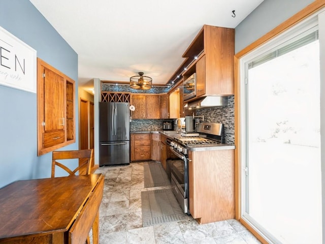 820 Hillview Dr, Marion, IA 52302 - kitchen featuring appliances with stainless steel finishes, backsplash, a ceiling fan, open shelves, and brown cabinets