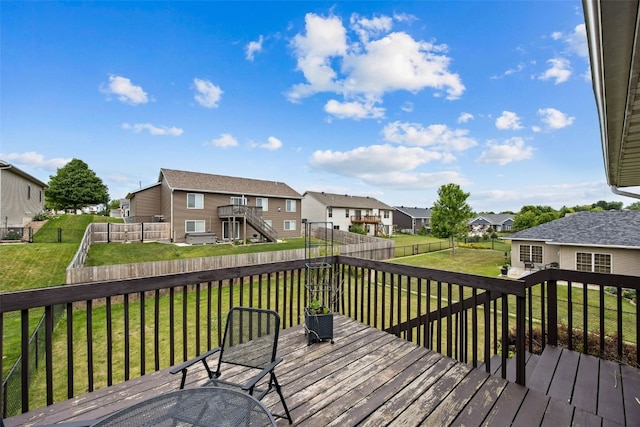609 W Orange St, West Branch, IA 52358 - deck featuring a residential view, a fenced backyard, and outdoor dining space