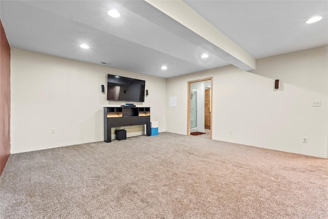 101 Golf Cir, Winfield, IA 52659 - unfurnished living room featuring carpet and recessed lighting