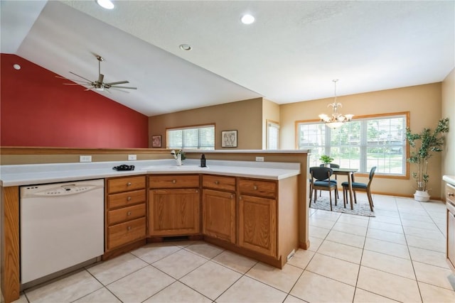 4118 Paradise Ct NW, Cedar Rapids, IA 52405 - kitchen with dishwasher, a chandelier, lofted ceiling, light countertops, and healthy amount of natural light