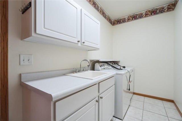 4118 Paradise Ct NW, Cedar Rapids, IA 52405 - laundry area with washing machine and dryer, cabinet space, and light tile patterned flooring