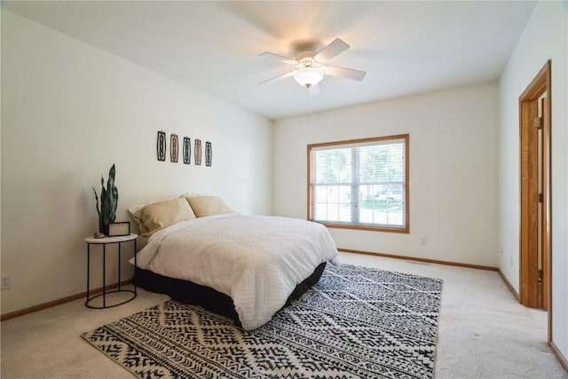4118 Paradise Ct NW, Cedar Rapids, IA 52405 - bedroom featuring light colored carpet and a ceiling fan