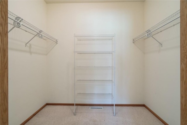 4118 Paradise Ct NW, Cedar Rapids, IA 52405 - spacious closet featuring carpet floors
