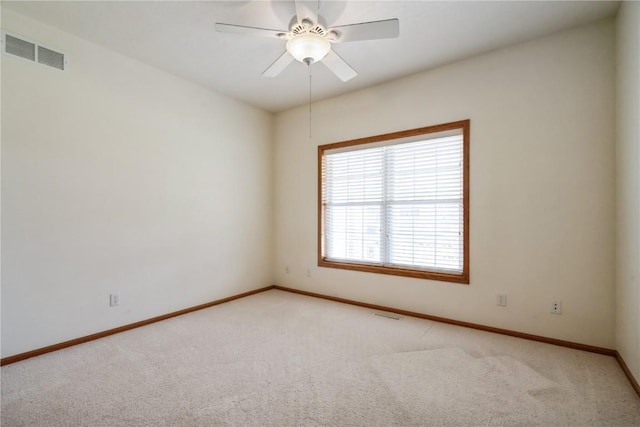 4118 Paradise Ct NW, Cedar Rapids, IA 52405 - unfurnished room featuring light carpet and ceiling fan