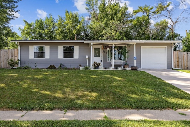 665 Hillview Dr, Marion, IA 52302 - single story home featuring a porch, an attached garage, and driveway
