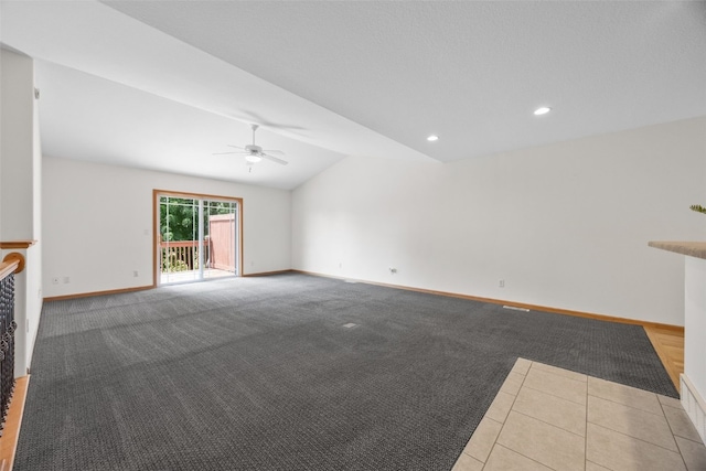 2054 Shortgrass Pl, Marion, IA 52302 - unfurnished living room featuring a ceiling fan, vaulted ceiling, tile patterned flooring, recessed lighting, and carpet