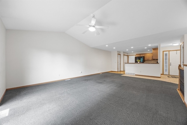 2054 Shortgrass Pl, Marion, IA 52302 - unfurnished living room featuring a ceiling fan, light carpet, recessed lighting, and vaulted ceiling