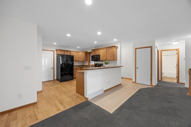 2054 Shortgrass Pl, Marion, IA 52302 - kitchen with black appliances, recessed lighting, and dark countertops
