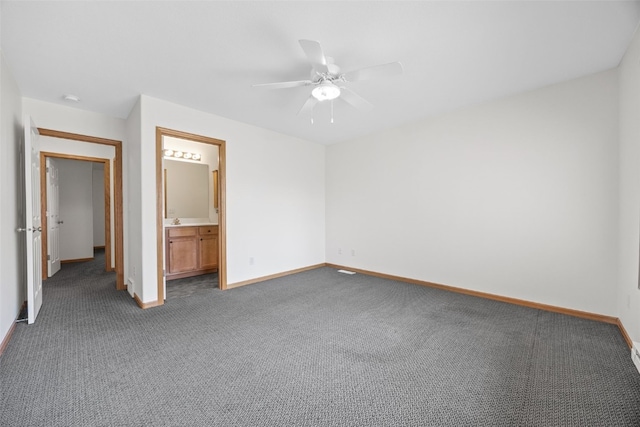 2054 Shortgrass Pl, Marion, IA 52302 - unfurnished bedroom with carpet floors, ceiling fan, and ensuite bath