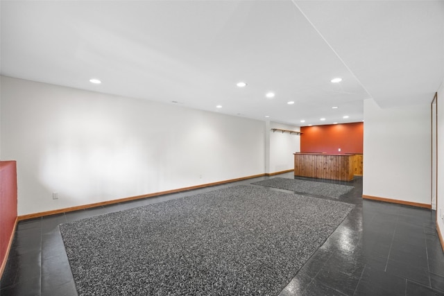 2054 Shortgrass Pl, Marion, IA 52302 - unfurnished living room with recessed lighting and bar