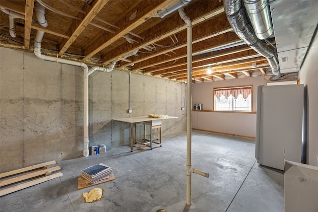 2054 Shortgrass Pl, Marion, IA 52302 - basement with freestanding refrigerator