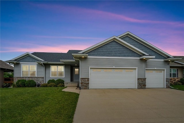 8313 Monterey Dr NE, Cedar Rapids, IA 52402 - craftsman-style home featuring stone siding, concrete driveway, and a garage