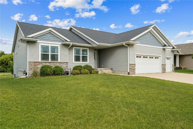 8313 Monterey Dr NE, Cedar Rapids, IA 52402 - craftsman-style home featuring stone siding, a garage, a front yard, and driveway
