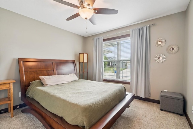 8313 Monterey Dr NE, Cedar Rapids, IA 52402 - bedroom featuring light carpet and ceiling fan