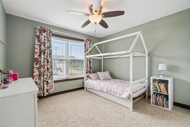 8313 Monterey Dr NE, Cedar Rapids, IA 52402 - carpeted bedroom featuring baseboards and ceiling fan