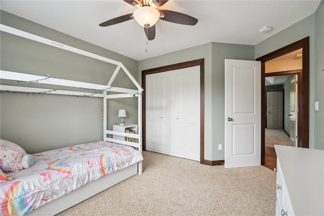 8313 Monterey Dr NE, Cedar Rapids, IA 52402 - bedroom with carpet, a closet, and ceiling fan