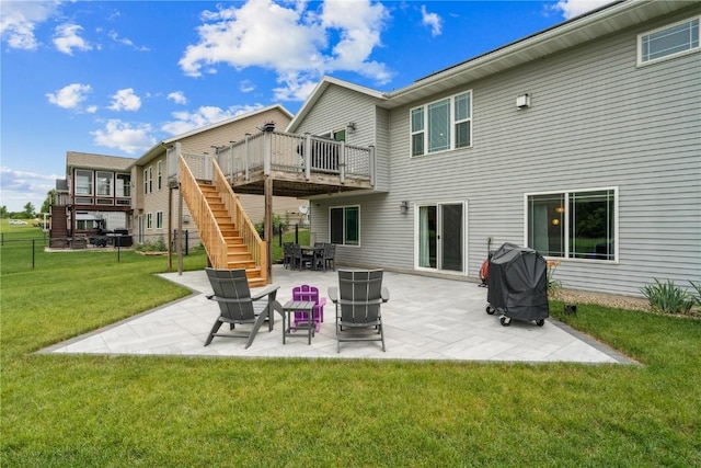 8313 Monterey Dr NE, Cedar Rapids, IA 52402 - back of property featuring stairs, a deck, and a patio
