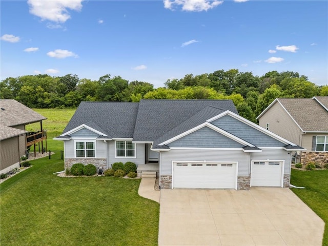 8313 Monterey Dr NE, Cedar Rapids, IA 52402 - craftsman house with stone siding, a garage, and concrete driveway