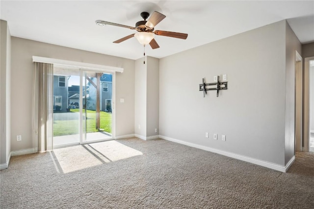 1810 Goose Lake Cir, North Liberty, IA 52317 - spare room featuring carpet flooring and ceiling fan