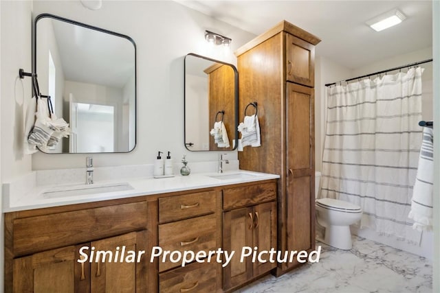 4620 Preston Ln, Iowa City, IA 52246 - full bath with marble finish floors, double vanity, and a shower with curtain