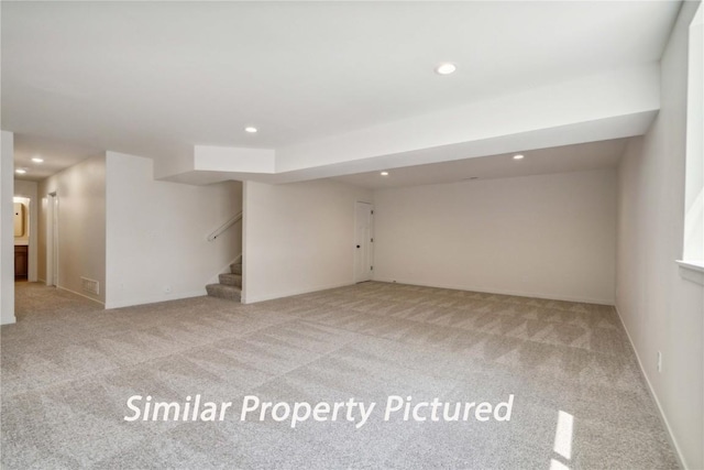 4620 Preston Ln, Iowa City, IA 52246 - finished below grade area featuring carpet, recessed lighting, and stairway