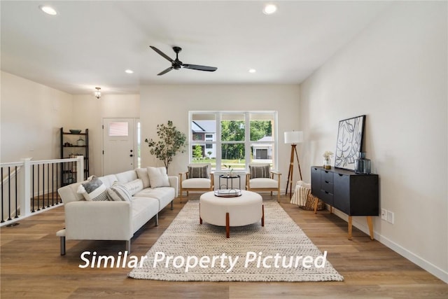 4620 Preston Ln, Iowa City, IA 52246 - living room featuring recessed lighting, wood finished floors, and a ceiling fan