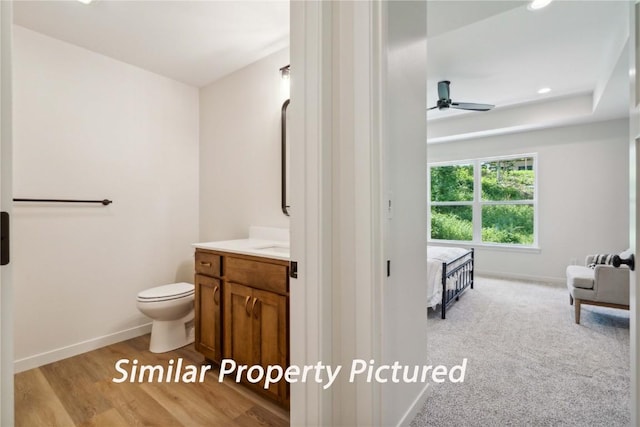 4620 Preston Ln, Iowa City, IA 52246 - bathroom featuring vanity, a ceiling fan, ensuite bath, and recessed lighting