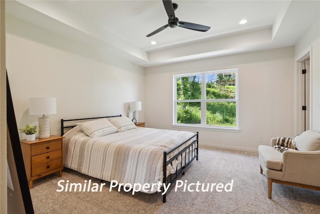 4620 Preston Ln, Iowa City, IA 52246 - bedroom featuring carpet, a tray ceiling, recessed lighting, and ceiling fan
